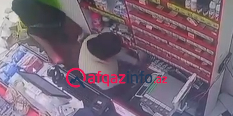 Bakıda qaraçı qadınlar hicab bağlayıb marketi taladı